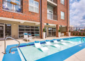 Thumbnail 21 of 35 - Swimming Pool With Relaxing Sundecks at Greenway at Stadium Park, Greensboro