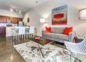Thumbnail 27 of 35 - Living Room Come Kitchen View at Greenway at Stadium Park, Greensboro