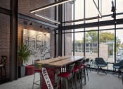 Thumbnail 17 of 23 - Co-Working Area at The News Apartments in Troy, NY
