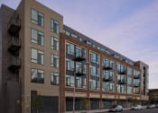 Thumbnail 2 of 23 - New addition of The News Apartments as seen from 6th Avenue. at The News Apartments in Troy, NY