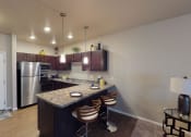 Thumbnail 2 of 25 - Gourmet Kitchen at Cascades of Mandan, North Dakota