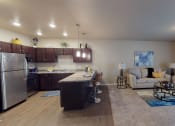 Thumbnail 3 of 25 - Kitchen And Living Area at Cascades of Mandan, Mandan, ND