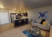 Thumbnail 4 of 25 - Living Room With Kitchen at Cascades of Mandan, Mandan, ND, 58554