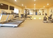 Thumbnail 12 of 25 - workout room, fitness center, gym  at Cascades of Mandan, Mandan