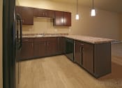Thumbnail 17 of 25 - kitchen at Cascades of Mandan, Mandan