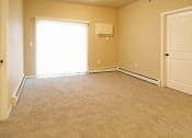 Thumbnail 16 of 25 - living room, patio door at Cascades of Mandan, Mandan, ND, 58554