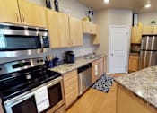 Thumbnail 3 of 34 - kitchen, fargo apartment, light cabinets