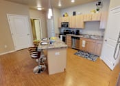 Thumbnail 7 of 34 - kitchen with island 