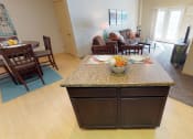 Thumbnail 11 of 26 - kitchen island, cabinets at Stonebridge Villas Apartments, Minot