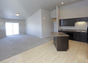 Thumbnail 21 of 26 - Kitchen and dining at Stonebridge Villas Apartments, Minot, North Dakota