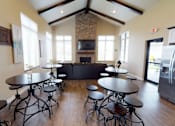 Thumbnail 19 of 40 - community room with table and chairs