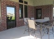 Thumbnail 22 of 40 - patio with table and chairs