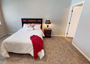 Thumbnail 16 of 40 - bedroom with bed and nightstand