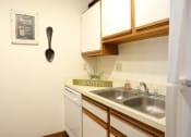 Thumbnail 10 of 18 - Image of kitchen with cabinets and sink