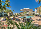 Thumbnail 15 of 32 - Umbrellas and Lounge Chairs by the Pool at La Contessa Luxury Apartments, Texas, 78045