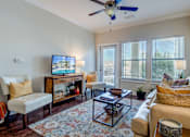 Thumbnail 25 of 32 - Living room with Natural Light at La Contessa Luxury Apartments, Laredo, 78045