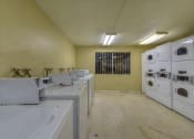 Thumbnail 14 of 36 - Fairway Manor Apartment Home Laundry Facilities