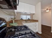 Thumbnail 22 of 36 - Fairway Manor Apartment Homes Kitchen Area