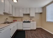Thumbnail 17 of 43 - Kitchen with cabinets at LAKE DIANNE, Santa Ana, 92705