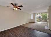 Thumbnail 18 of 43 - Living room and ceiling fan at LAKE DIANNE, Santa Ana, California