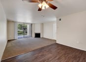 Thumbnail 25 of 43 - Living room and balcony at LAKE DIANNE, Santa Ana, California