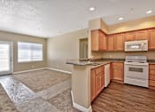 Thumbnail 22 of 48 - Living Room With Kitchen at TERRAZA DEL SOL, Rancho Cucamonga