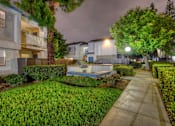 Thumbnail 4 of 21 - Windwood Apartment Homes Grilling Area