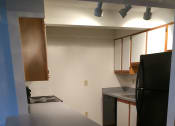 Thumbnail 10 of 21 - Image of kitchen with cabinets and appliances Loft Kitchen