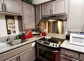 Thumbnail 11 of 22 - Kitchen at ETHAN TERRACE, California