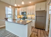 Thumbnail 25 of 45 - Kitchen of Home For Rent in Holt Michigan | Aspen Lakes Estates
