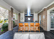 Thumbnail 27 of 41 - Outdoor Entertainment Space with Gas Grill and Bar Height Seating and Amble Counterspace at Alden Place at South Square Apartments, Durham, NC 27707