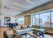 Thumbnail 12 of 33 - living room with large windows at The Grand, Kansas City, MO