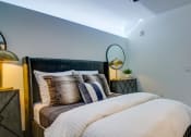 Thumbnail 23 of 33 - bed in a bedroom  at The Grand, Kansas City, Missouri