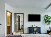 Thumbnail 28 of 33 - Living room area with tv at The Grand, Missouri, 64106