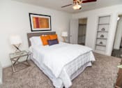 Thumbnail 2 of 11 - View of bedroom showing built-in shelving and walk-in closet.