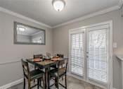 Thumbnail 4 of 39 - Cozy dining nook beside kitchen in upgraded Riata Park apartment