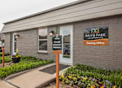 Thumbnail 6 of 17 - Leasing office and signage at Davis Park Apartments North Richland Hills