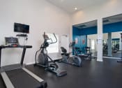 Thumbnail 13 of 20 - Modern Fitness Center at Parc at 5 Apartments, Downey, California