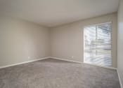 Thumbnail 19 of 20 - Living Room With Glass Door at Parc at 5 Apartments, Downey