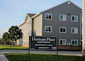 Thumbnail 7 of 18 - outside of horizon place apartments building