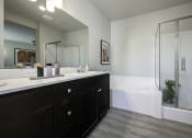 Thumbnail 24 of 34 - Bathroom with Tub and Shower
