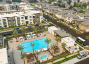 Thumbnail 33 of 34 - Aerial View of the Pool and Cluibhouse