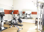 Thumbnail 3 of 11 - Fitness Center with Updated Equipment at Hawthorne House, Midland, TX