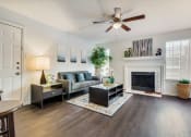 Thumbnail 7 of 42 - Sophisticated Living Room Remodel With Fireplace at Wildwood Apartments, CLEAR Property Management, Texas, 78752