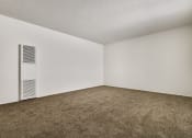 Thumbnail 34 of 48 - Living room with air conditioning, carpeted floors