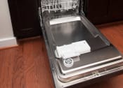 Thumbnail 22 of 25 - a dishwasher with its door open in a kitchen
