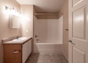 Thumbnail 38 of 38 - Oval Tub With Combo Shower at Bradford Ridge Apartments, Bloomington