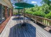 Thumbnail 27 of 38 - Shaded Patio Area at Bradford Ridge Apartments, Indiana, 47403