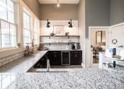 Thumbnail 20 of 25 - Fully Equipped Kitchen In Clubhouse at Champion Farms Apartments, Louisville