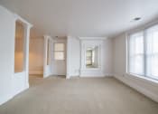 Thumbnail 22 of 28 - Living Room With Expansive Window at The Plaza at Library Square, Indiana